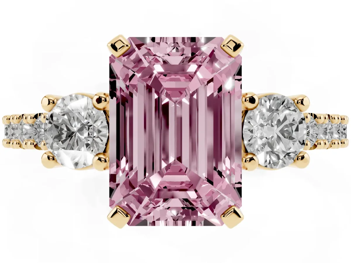 Fancy Pink Emerald Cut Three-Stone Diamond Pavé Band with Prong Setting Yellow gold