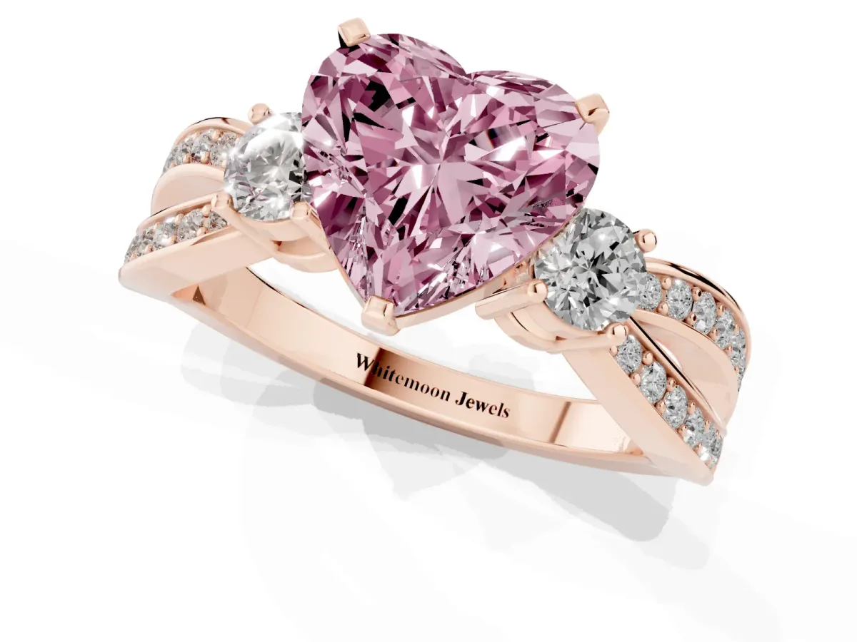 Fancy Pink Three-Stone Heart Cut Cut Diamond Twist Band with Prong Setting Rose gold
