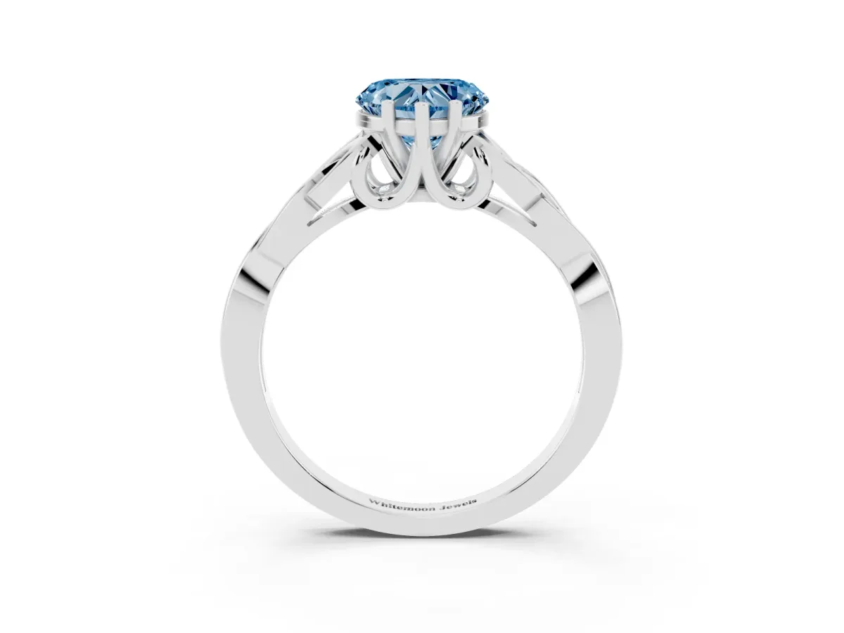 Fancy Blue Heart Cut Diamond Solitaire Engagement Ring with Celtic Knot Band and Four-Prong Setting Silver
