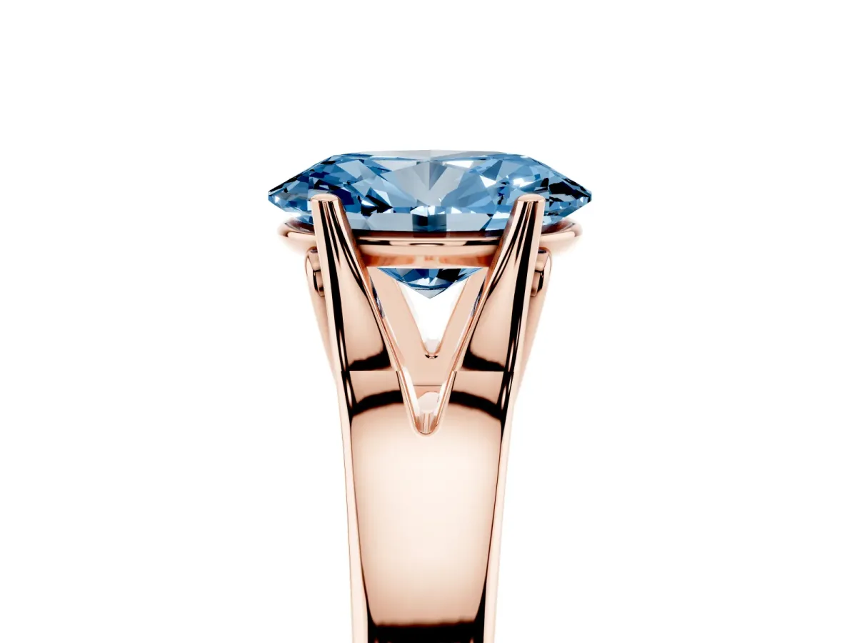 Fancy Blue Oval Cut Solitaire Diamond Ring with Cathedral Band and Four-Prong Setting Rose gold