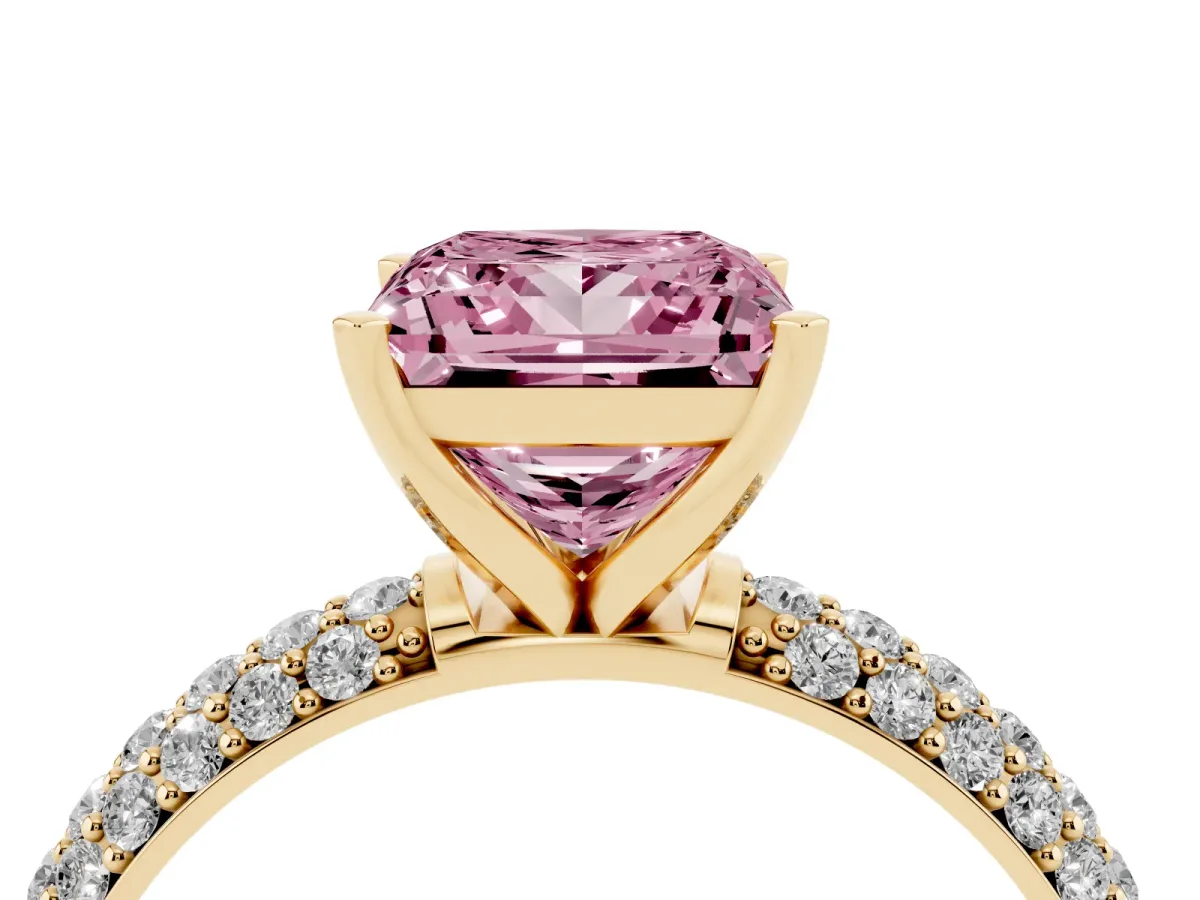 Fancy Pink Princess Cut Diamond Solitaire Ring with Prong Setting and Pavé Band Yellow gold