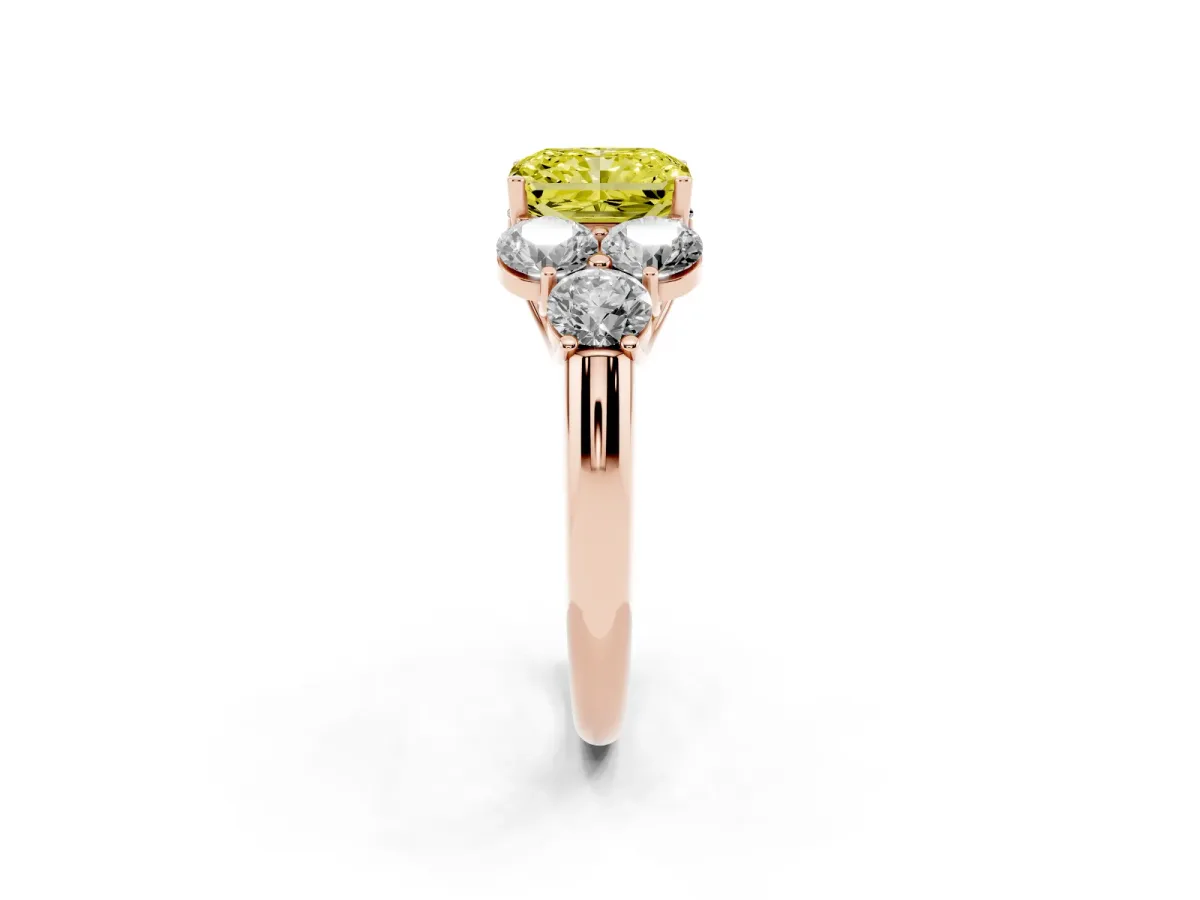 Fancy Yellow Radiant Cut Cut Diamond Cluster Ring with Round Accent Stones and Prong Setting on a Classic Band Rose gold