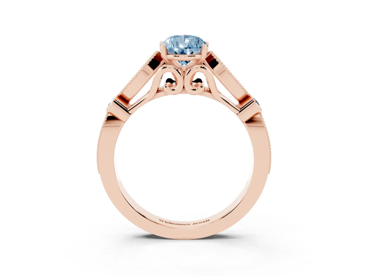 Fancy Blue Pear Cut Cut Diamond with Milgrain Marquise and Bezel Accents on a Solitaire Band with Prong Setting Rose gold