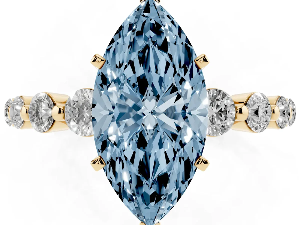Fancy Blue Marquise Cut Solitaire Diamond Ring with Pave Band and Four-Prong Setting Yellow gold