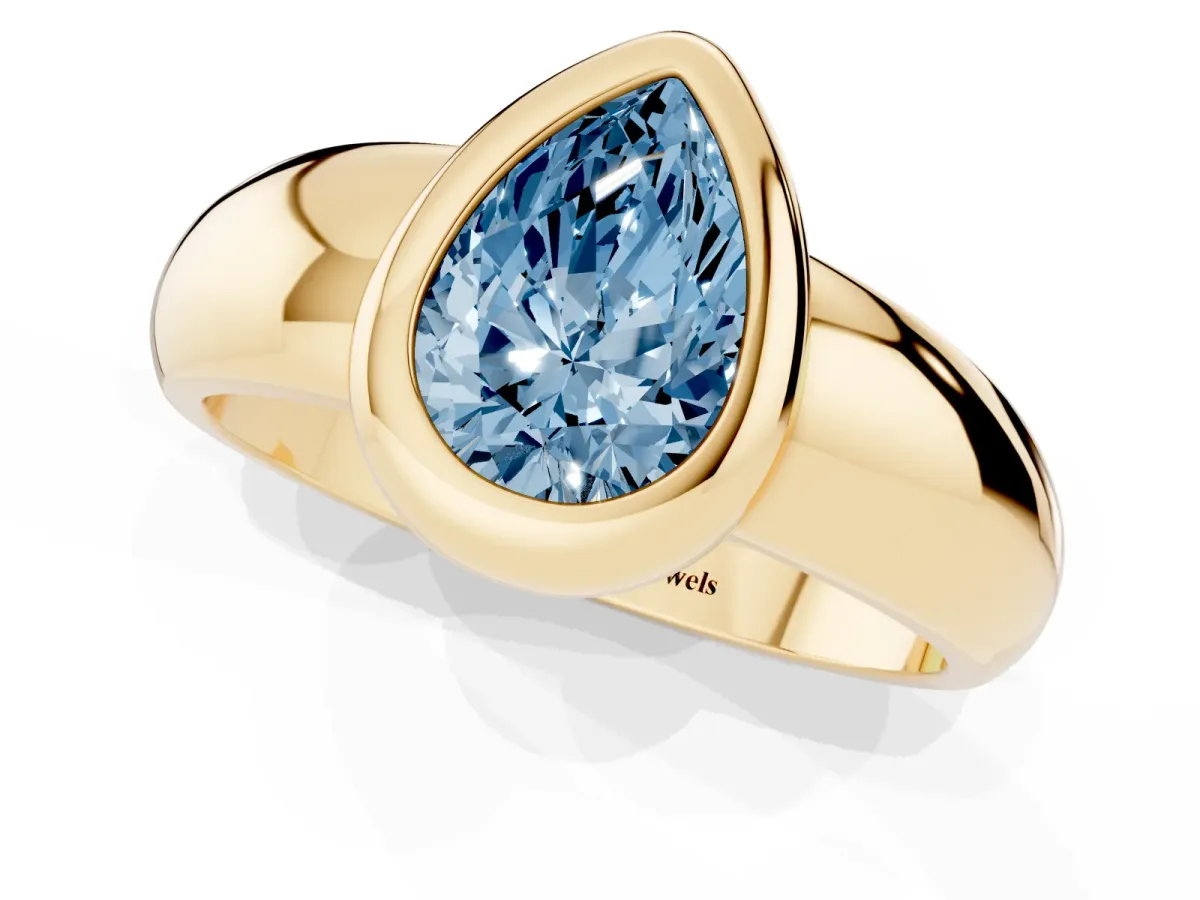 Fancy Blue Bezel Set Pear Cut Solitaire Ring with Wide Band Yellow gold