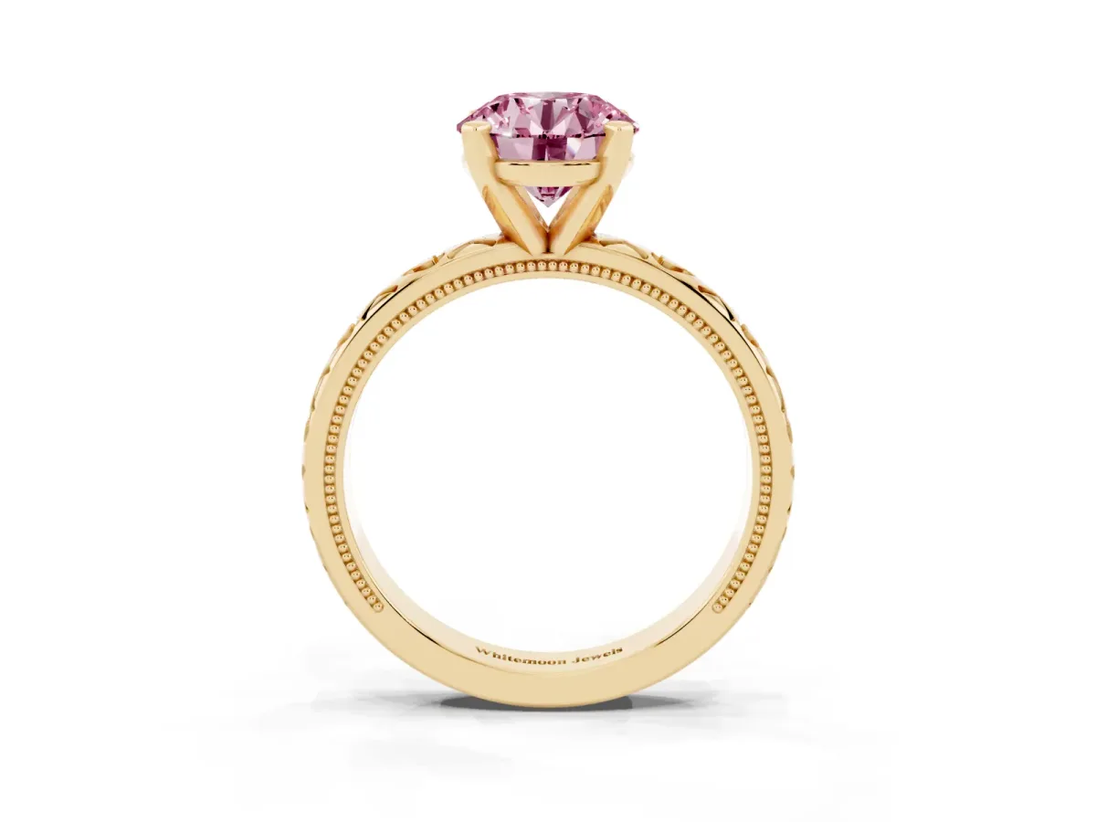 Fancy Pink Round Cut Solitaire Diamond Engagement Ring with XO Engraved Band and Four-Prong Setting Yellow gold