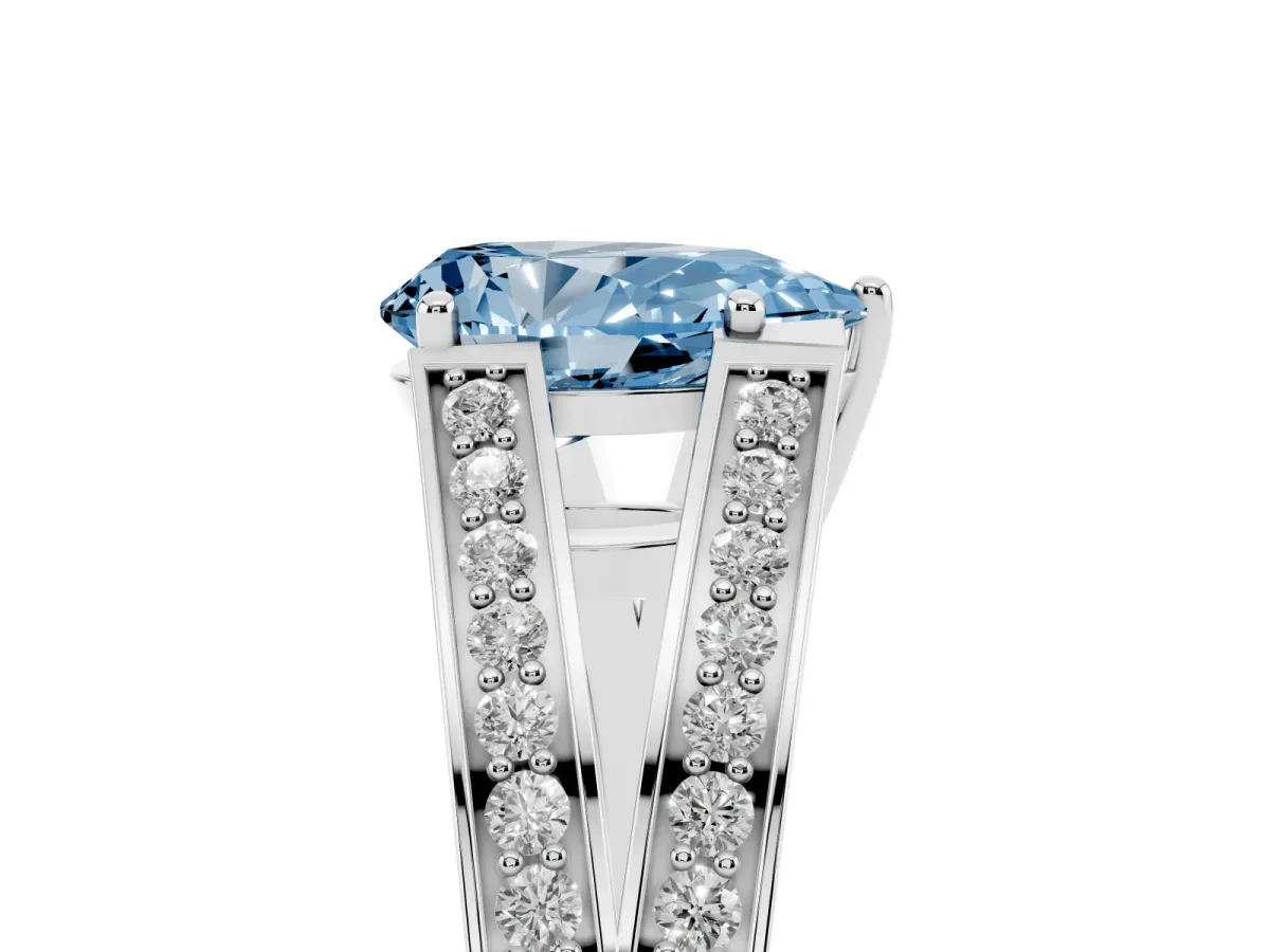 Fancy Blue Pear Cut Diamond Split Shank Ring with Pavé Band and Four-Prong Setting Silver