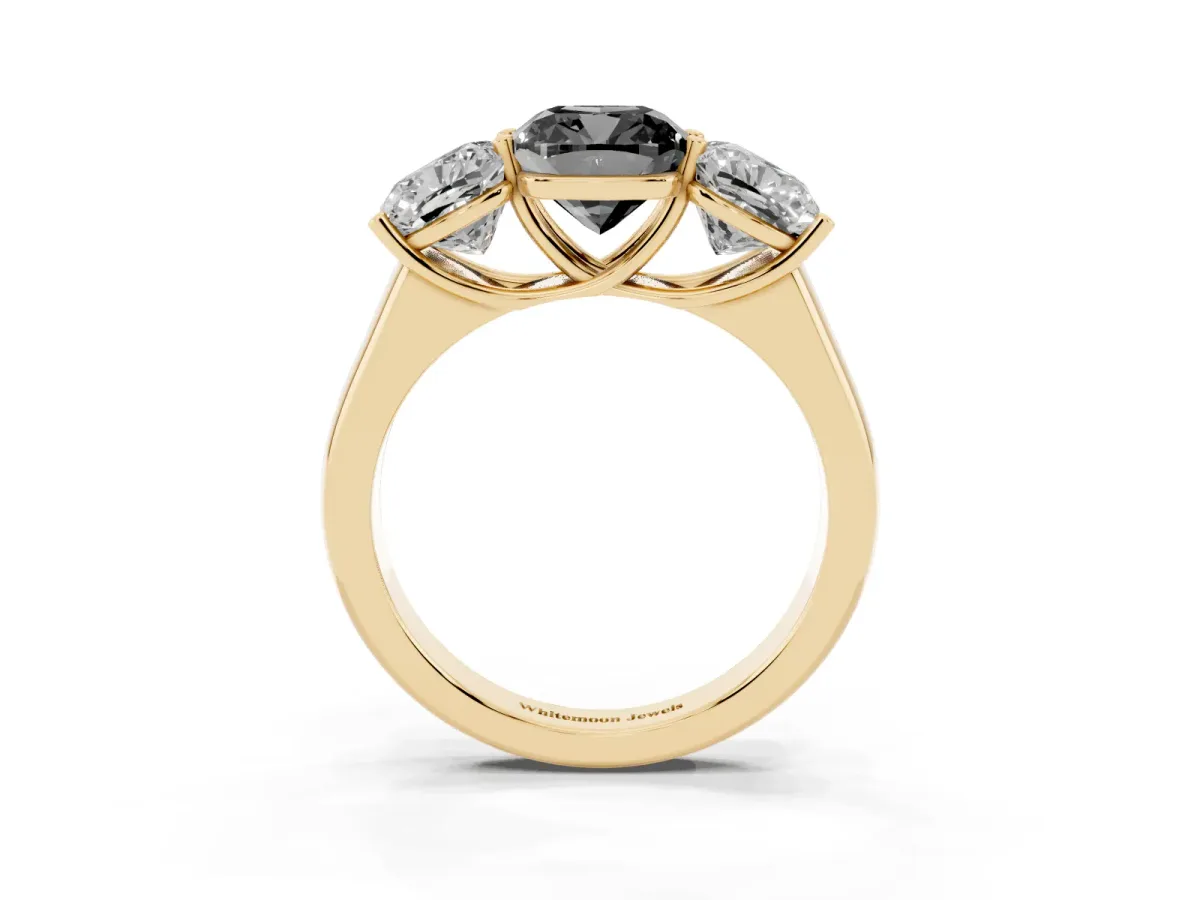 Fancy Black Cushion Cut Three-Stone Diamond Ring with Prong Setting on a Classic Band Yellow gold