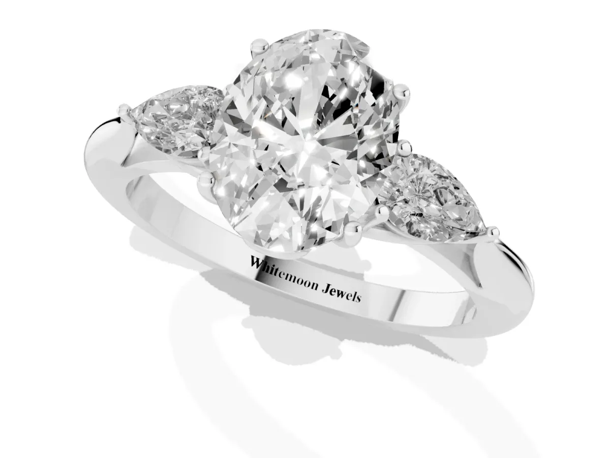 Three-Stone Oval Cut Brilliant Diamond Solitaire Ring with Tapered Band and Four-Prong Setting Silver