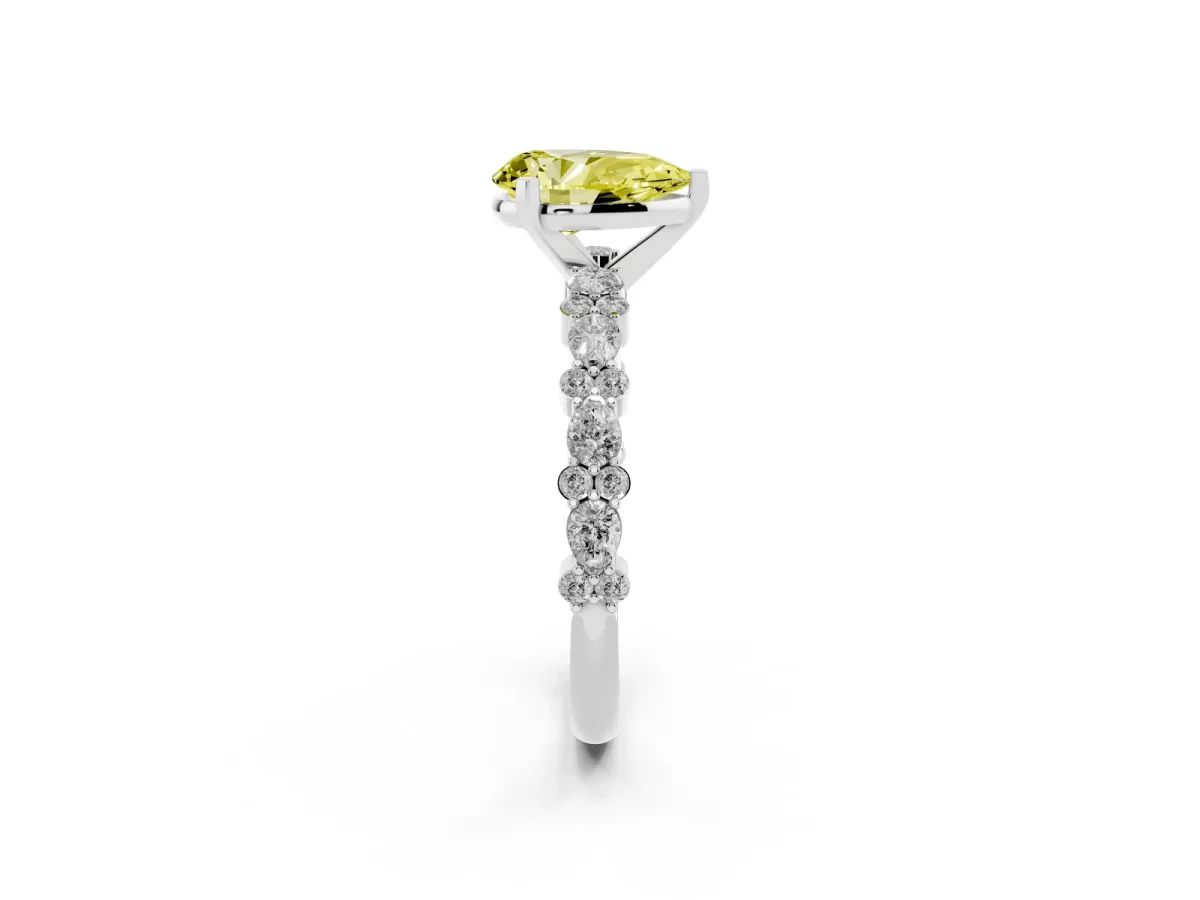 Fancy Yellow Pear Cut Diamond Side Stone Solitaire Ring with Round and Four-Prong Setting Platinum