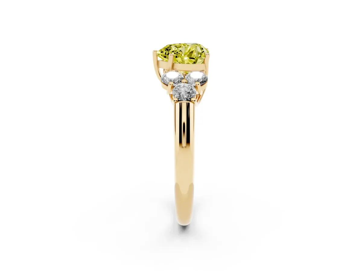 Fancy Yellow Heart Cut Cut Diamond Cluster Ring with Round Accent Stones and Prong Setting on a Classic Band Yellow gold