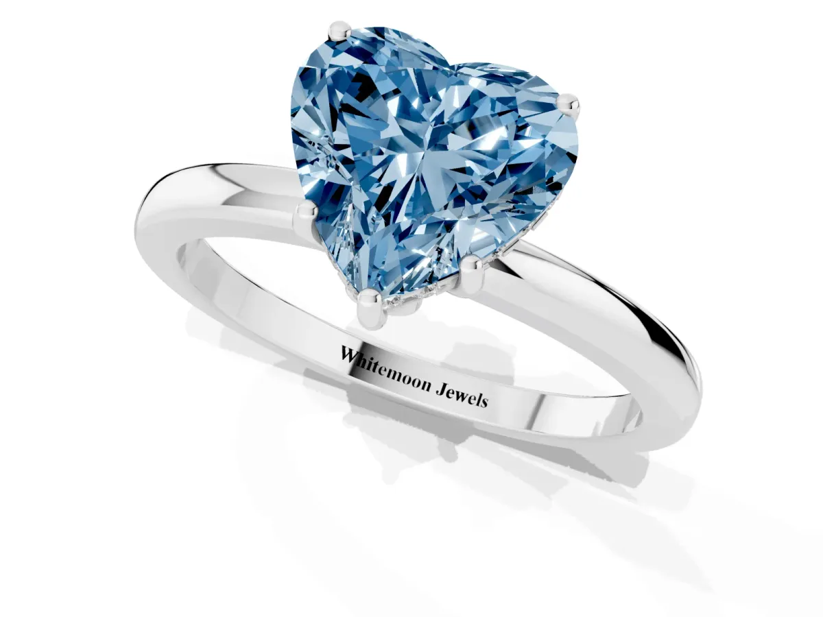 Fancy Blue Heart Cut Solitaire Diamond Ring with Prong Setting and Plain Band Silver