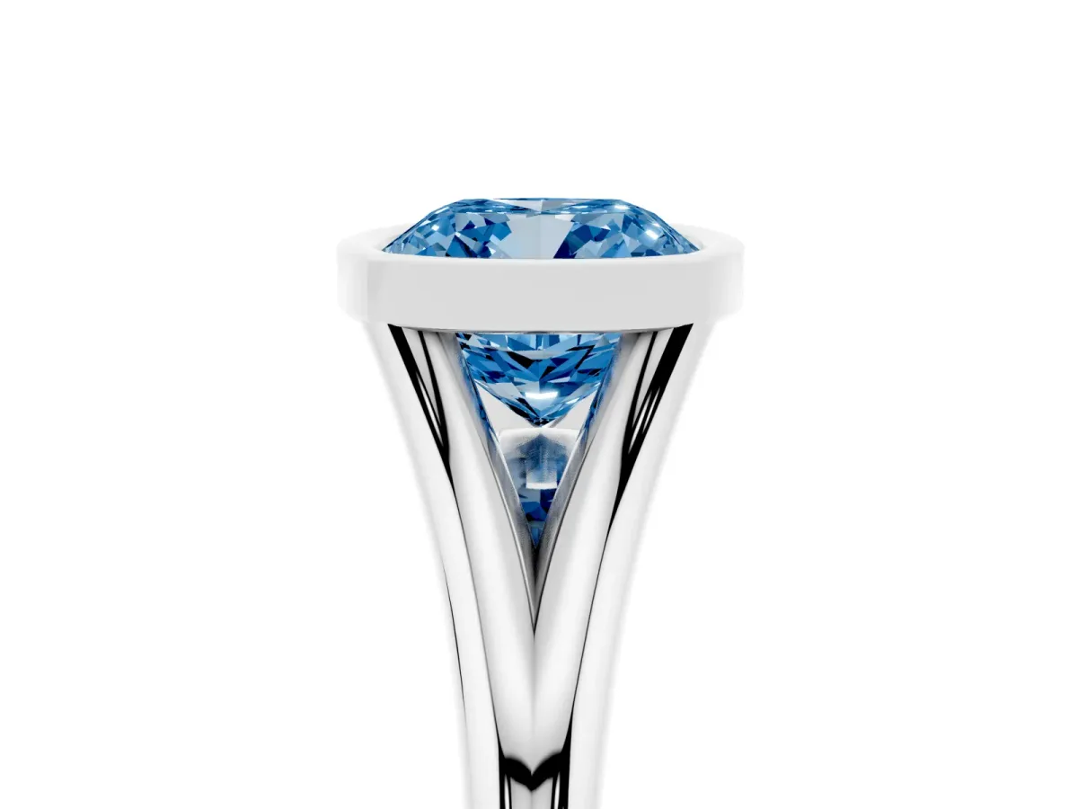 Fancy Blue Bezel Set Cushion Cut Cut Solitaire Ring with Tapered Band Silver