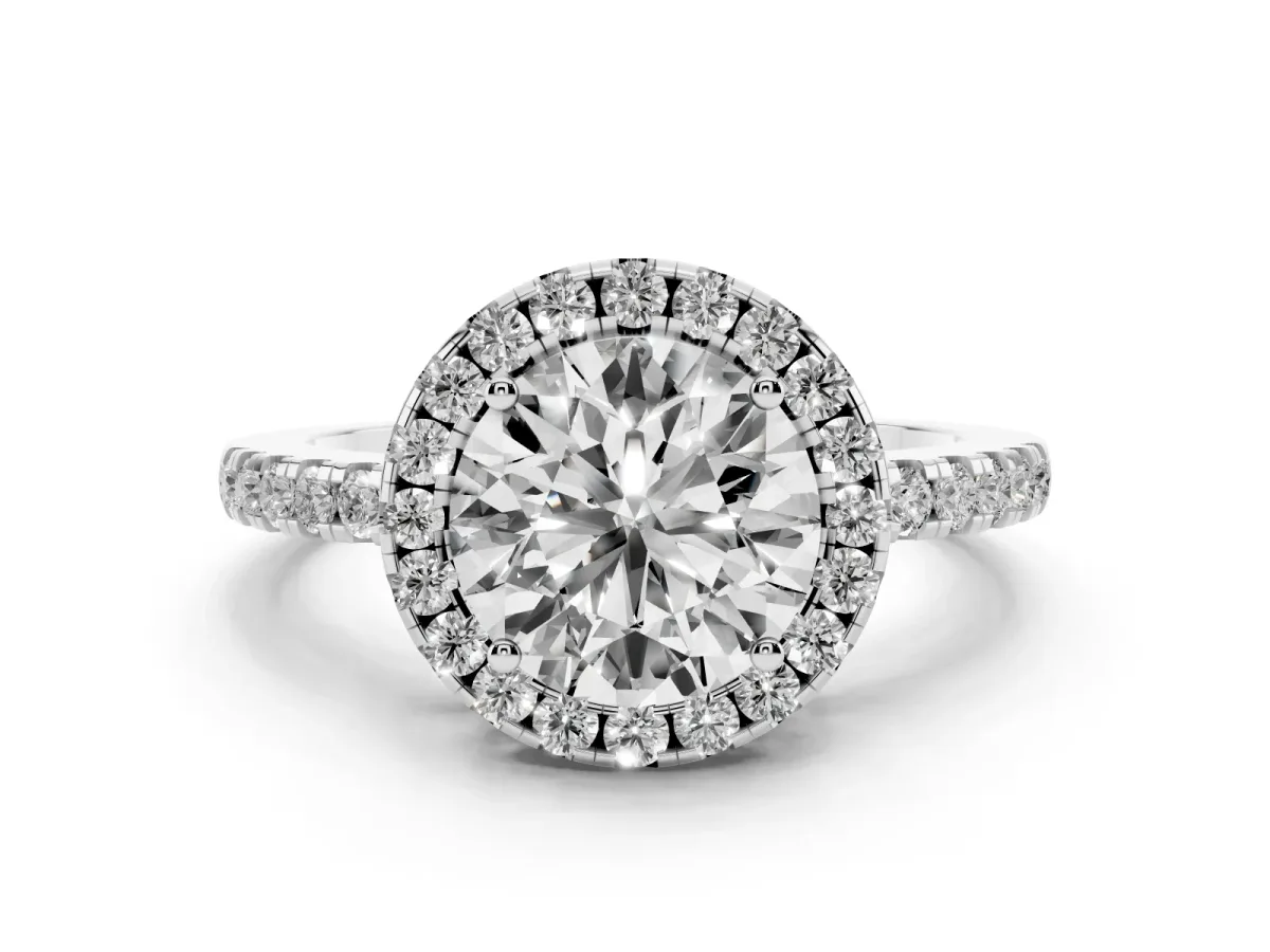 Round Cut Halo Diamond Engagement Ring with Pavé Band and Four-Prong Setting Silver