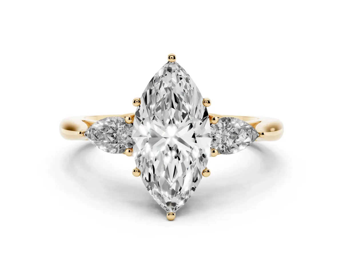 Three-Stone Marquise Cut Brilliant Diamond Solitaire Ring with Tapered Band and Four-Prong Setting Yellow gold