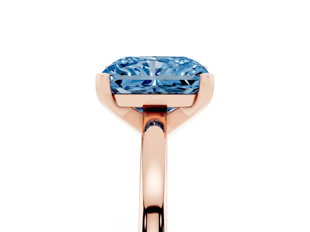 Fancy Blue Radiant Cut Solitaire Diamond Engagement Ring with Four-Prong Setting on a Classic Band Rose gold