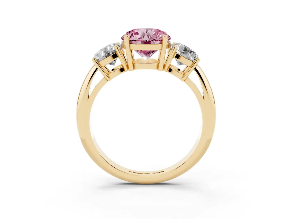 Fancy Pink Three-Stone Round Cut Cut Diamond Engagement Ring with Prong Setting on a White Gold Band Yellow gold