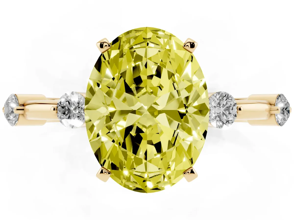 Fancy Yellow Oval Cut Solitaire Diamond Ring with Bezel Set Side Stones and Prong Setting Yellow gold