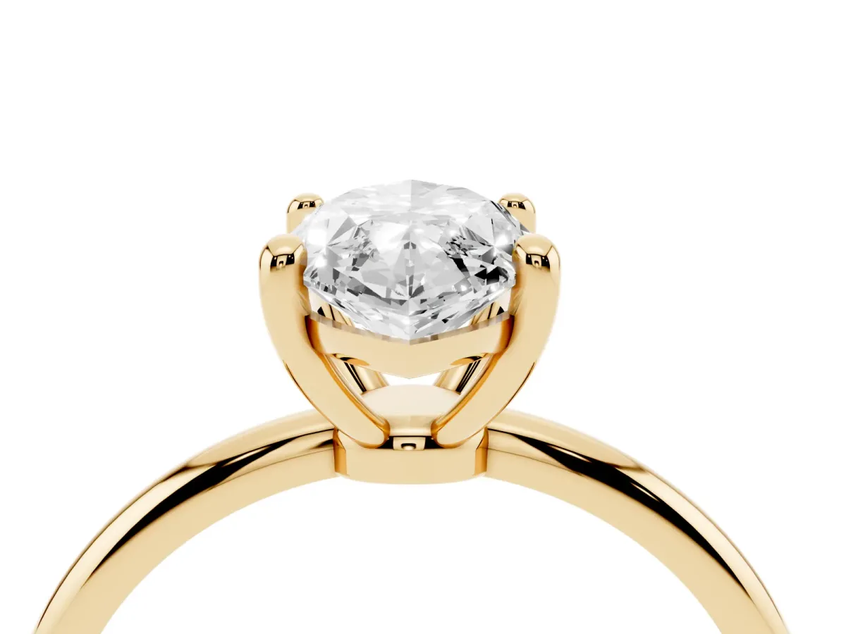 Marquise Cut Solitaire Diamond Ring with 4-Prong Setting on a Classic Band Yellow gold