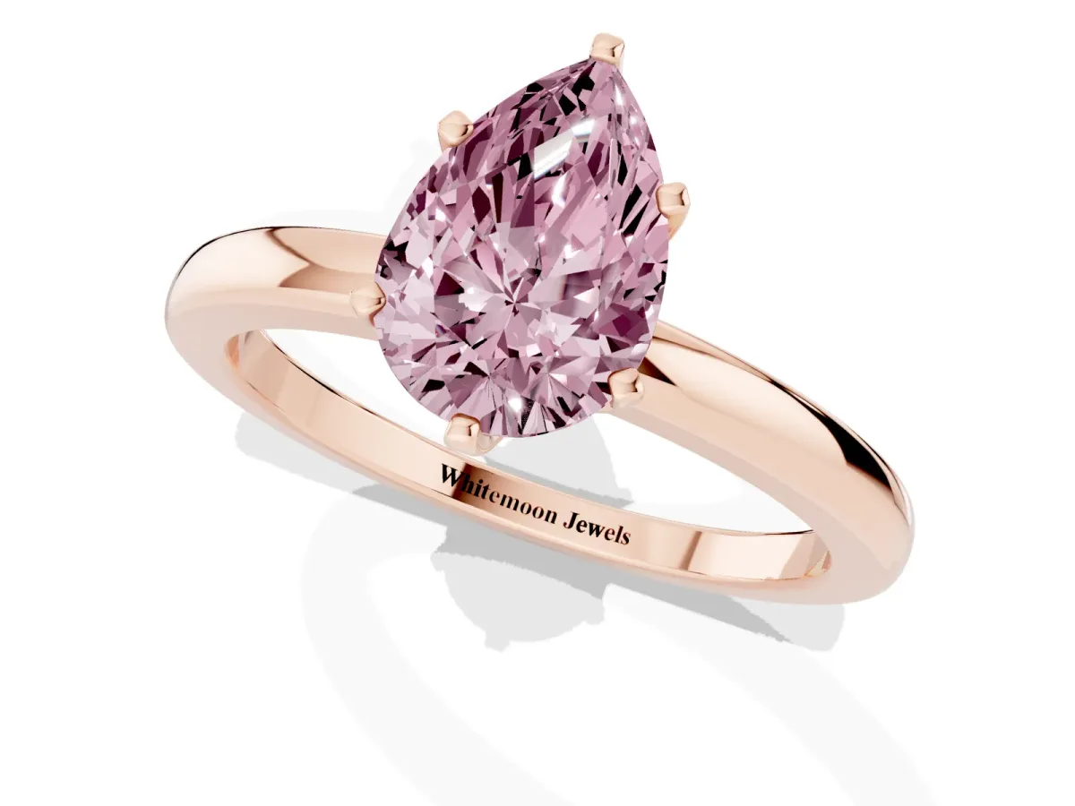 Fancy Pink Pear Cut Solitaire Diamond Ring with Six-Prong Setting on a Classic Band Rose gold