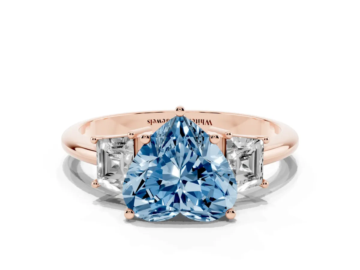 Fancy Blue Heart Cut Diamond Three-Stone Ring with Trapezoid Side Stones and Prong Setting Rose gold