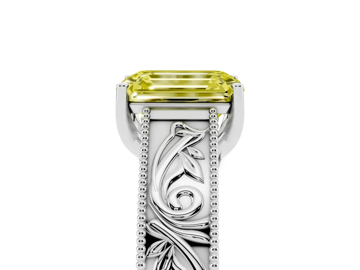 Fancy Yellow Emerald Cut Diamond Solitaire Ring with Engraved Band and Four-Prong Setting Silver