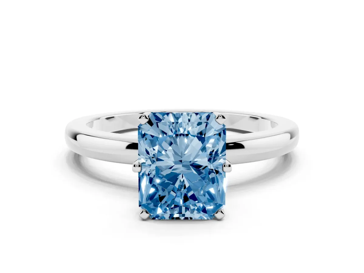 Fancy Blue Radiant Cut Solitaire Diamond Ring with Six-Prong Setting on a Classic Band Silver