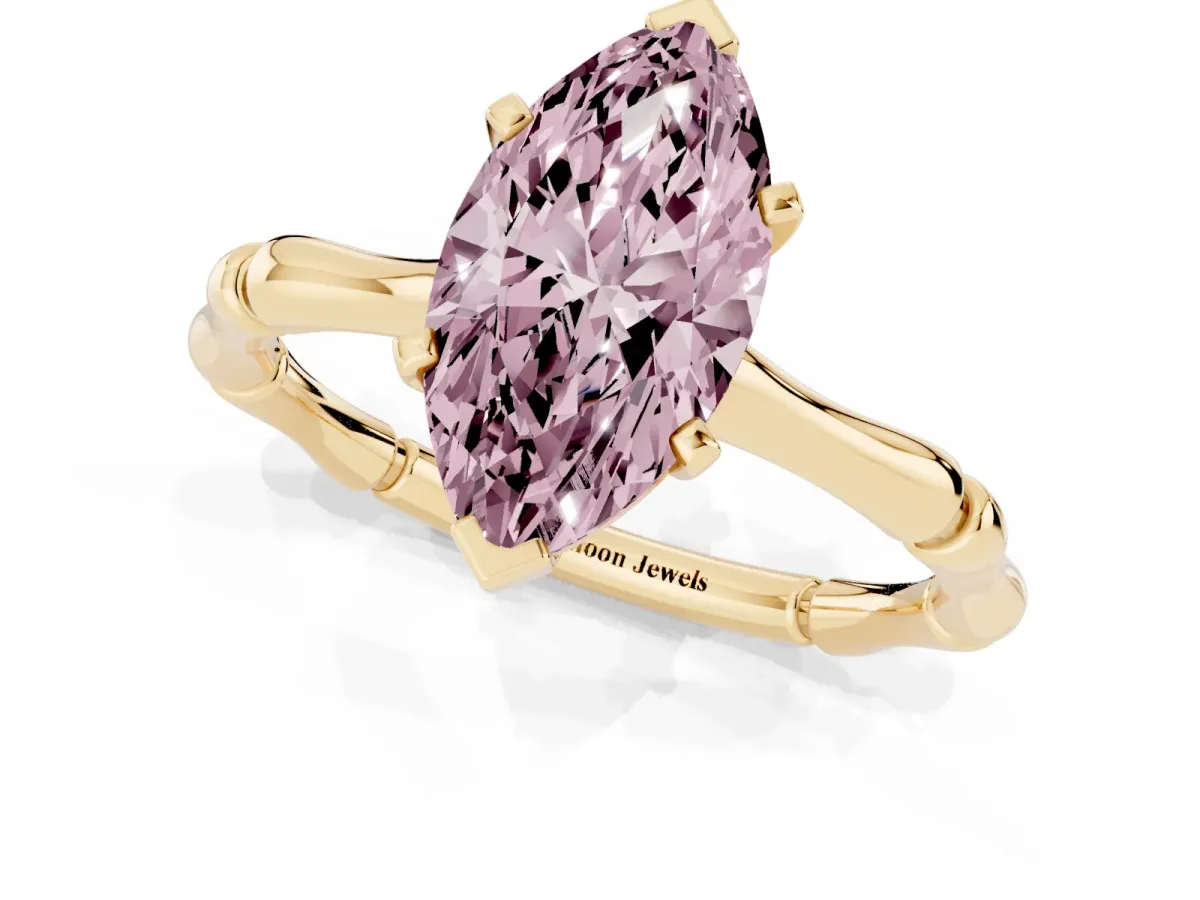 Fancy Pink Marquise Cut Solitaire Diamond Ring with Bamboo Band and Four-Prong Setting Yellow gold