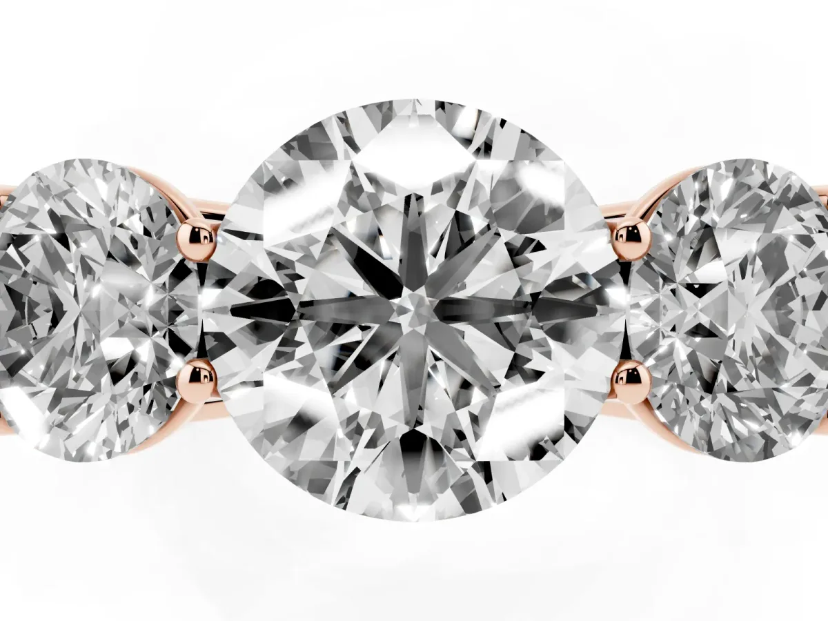 Round Cut Three-Stone Diamond Ring with Prong Setting on a Classic Band Rose gold