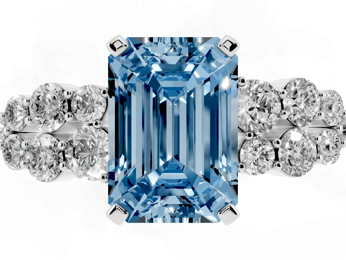 Fancy Blue Emerald Cut Cluster Diamond Engagement Ring with Pavé Band and Four-Prong Setting Silver