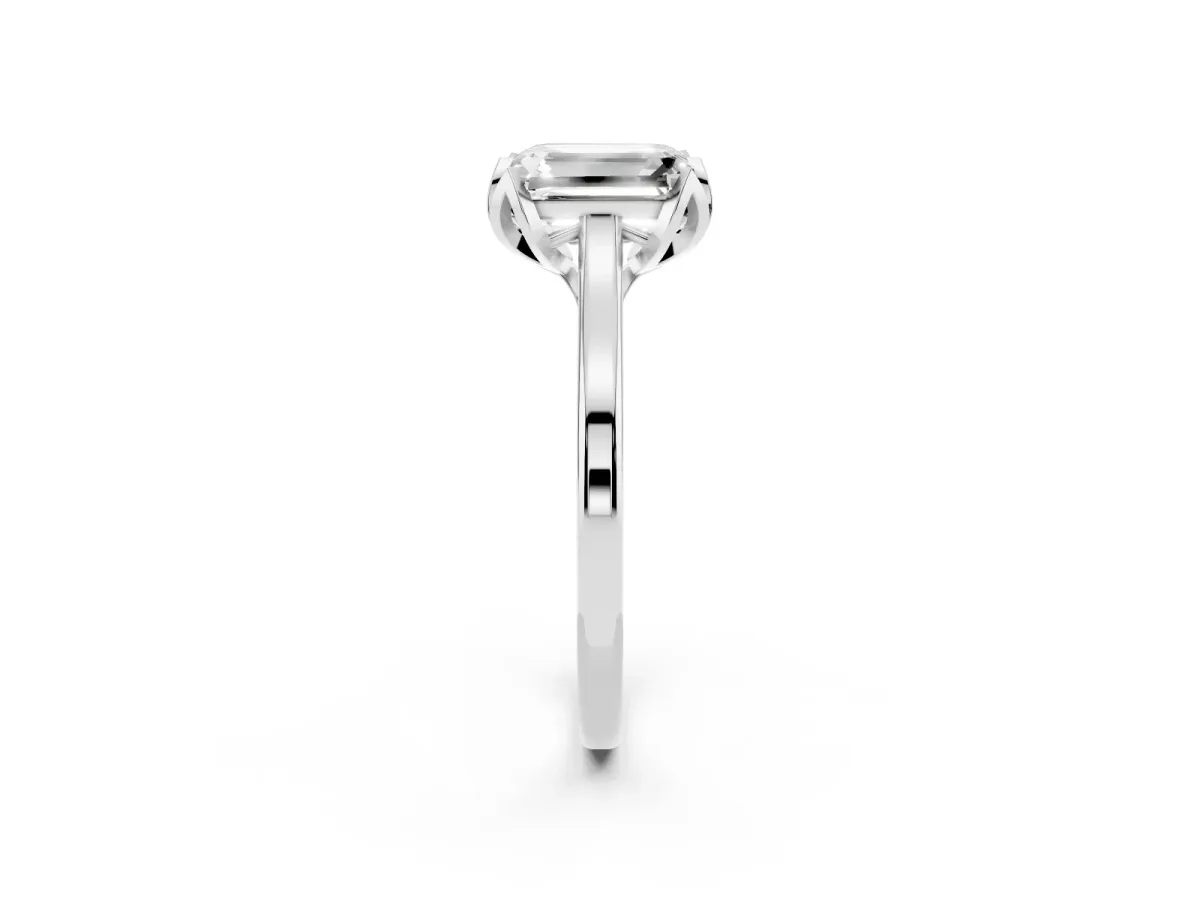Emerald Cut Diamond Solitaire Ring with Flower Prong Setting and Classic Band Platinum