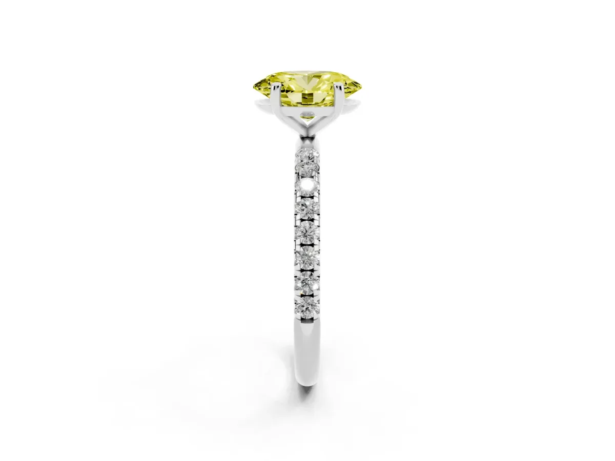 Fancy Yellow Oval Cut Cut Diamond Solitaire Ring with Micro Pave Band and Four Prong Setting Silver