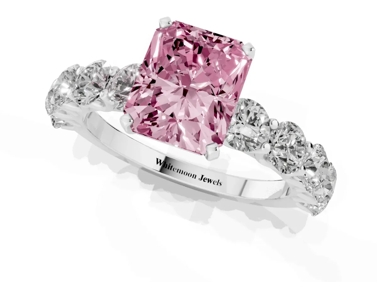 Fancy Pink Radiant Cut Diamond Prong Setting with Side Stones on a Pave Band Silver
