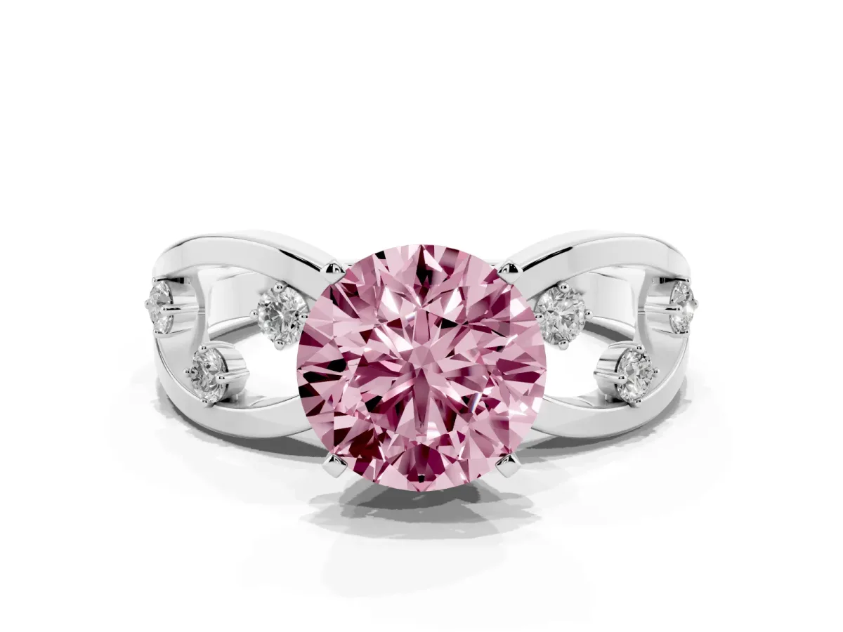 Fancy Pink Round Cut Cut Solitaire Diamond with Side Stones on Criss-Cross Band and Four-Prong Setting White gold