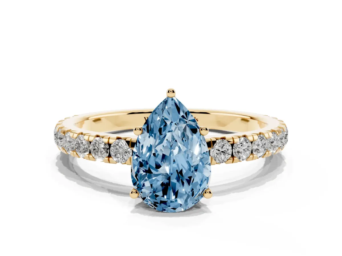 Fancy Blue Pear Cut Diamond Pavé Solitaire Engagement Ring with Four-Prong Setting Yellow gold
