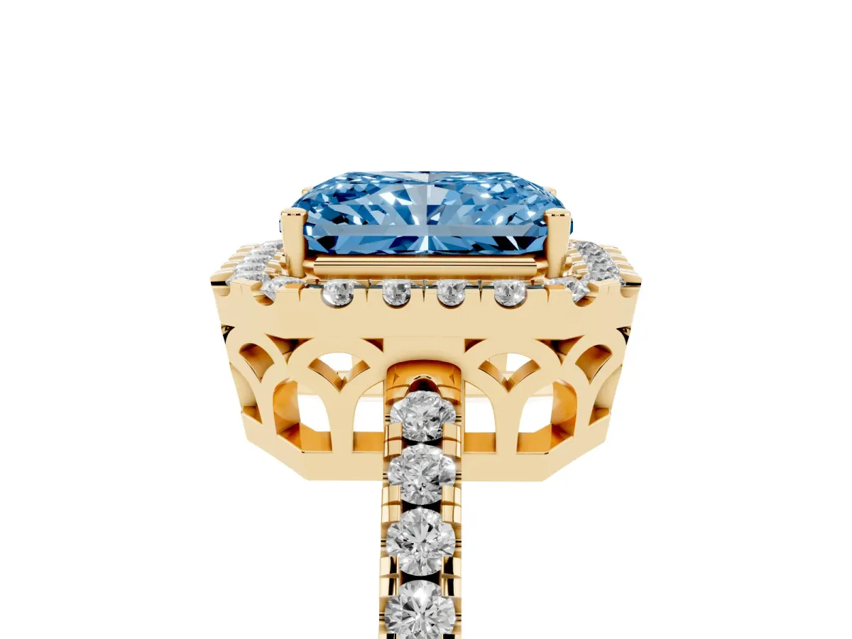 Fancy Blue Radiant Cut Halo Diamond Engagement Ring with Pavé Band and Four-Prong Setting Yellow gold