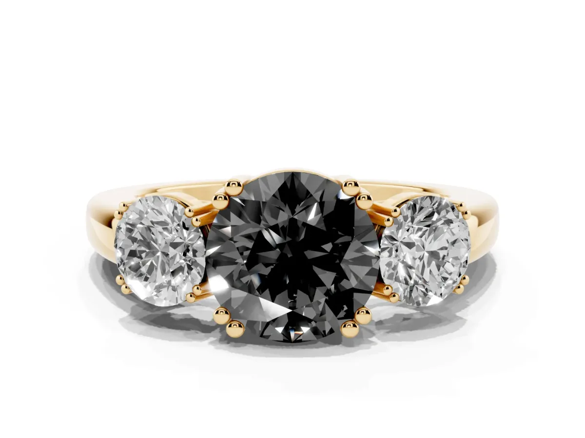 Fancy Black Three-Stone Round Cut Cut Diamond Ring with Channel Set Band and Four-Prong Setting Yellow gold