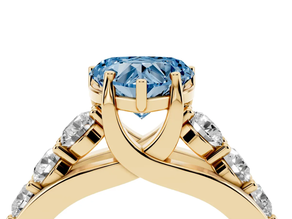 Fancy Blue Heart Cut Diamond Engagement Ring with Pavé Band and Four-Prong Setting Yellow gold