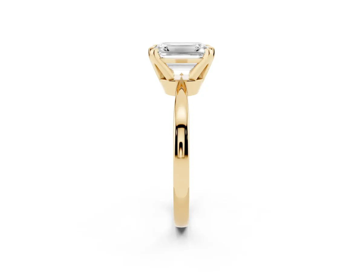 Emerald Cut Solitaire Engagement Ring with Six-Prong Setting and Tapered Band Yellow gold