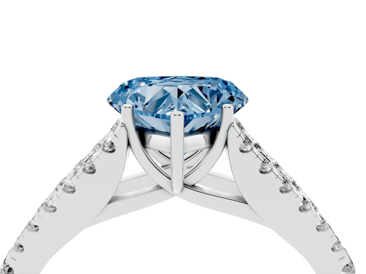 Fancy Blue Heart Cut Diamond Split Shank Engagement Ring with Round Pavé and Prong Setting Platinum