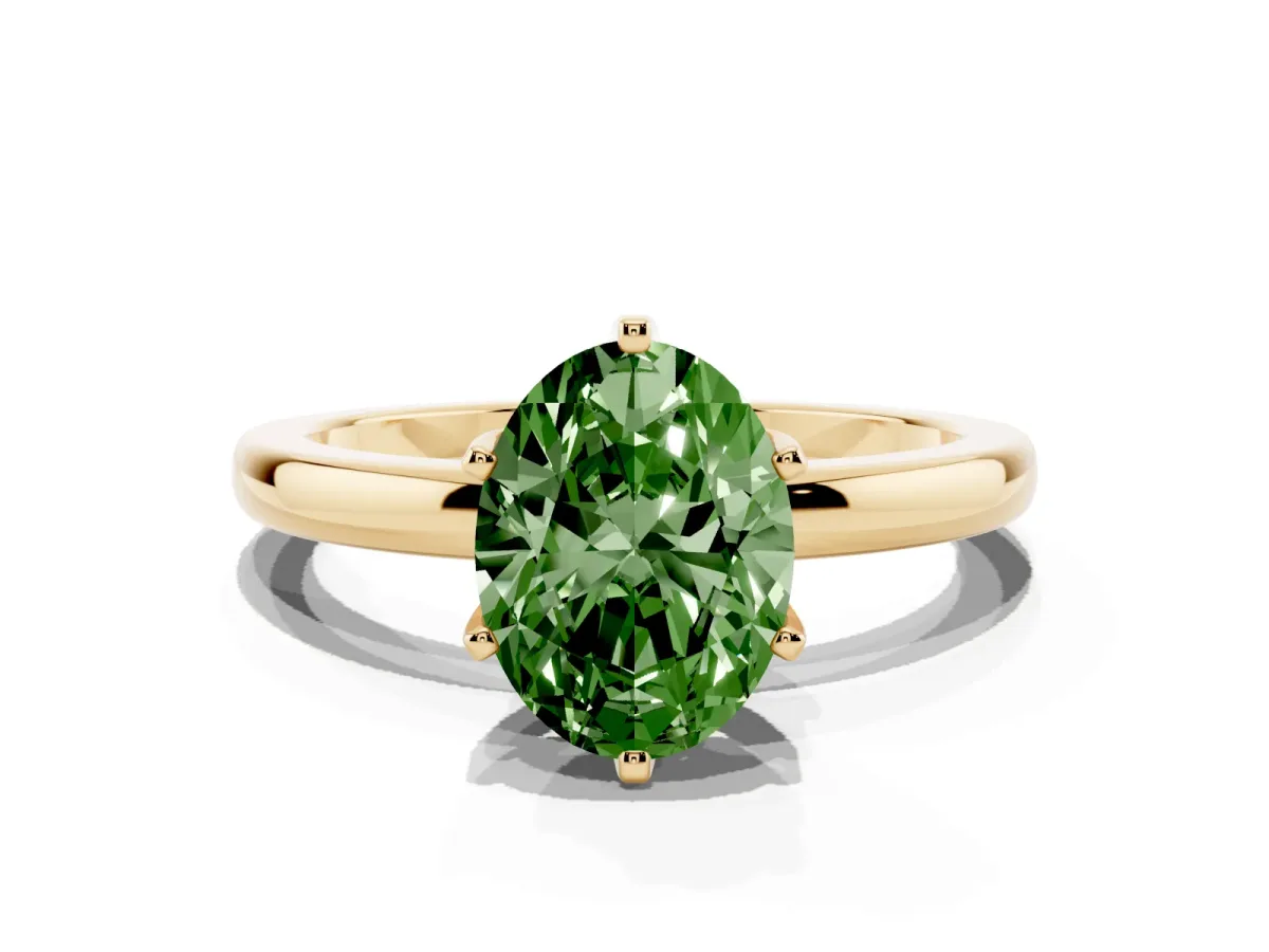 Fancy Green Oval Cut Solitaire Diamond Ring with Six-Prong Setting on a Classic Band Yellow gold