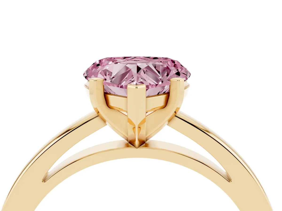 Fancy Pink Heart Cut Solitaire Diamond Engagement Ring with Four-Prong Setting on a Classic Band Yellow gold
