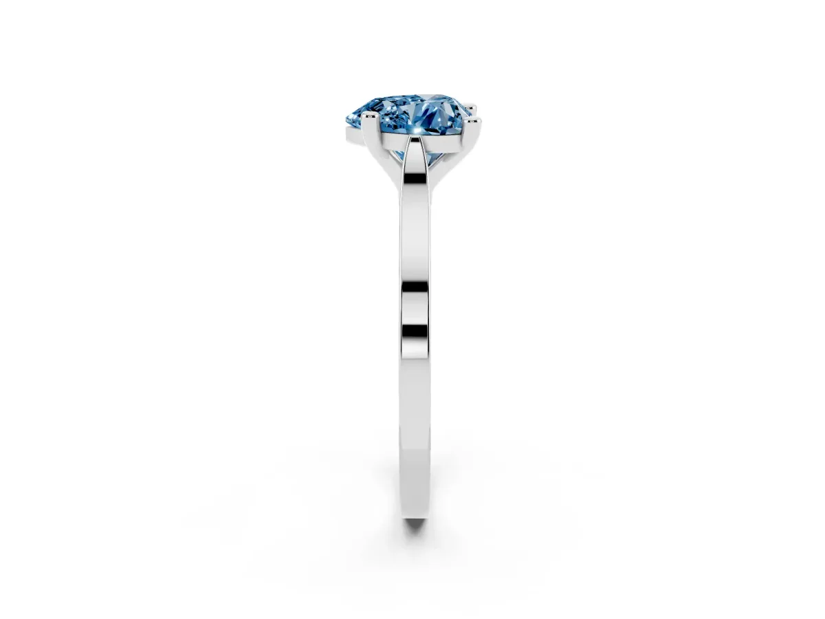 Fancy Blue Heart Cut Solitaire Diamond Ring with Four-Prong Setting and Tapered Band Platinum