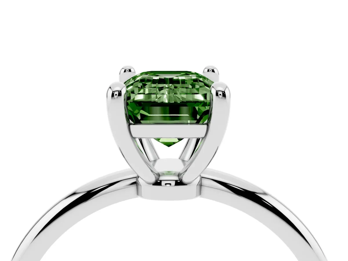 Fancy Green Emerald Cut Solitaire Diamond Ring with 4-Prong Setting on a Classic Band Platinum