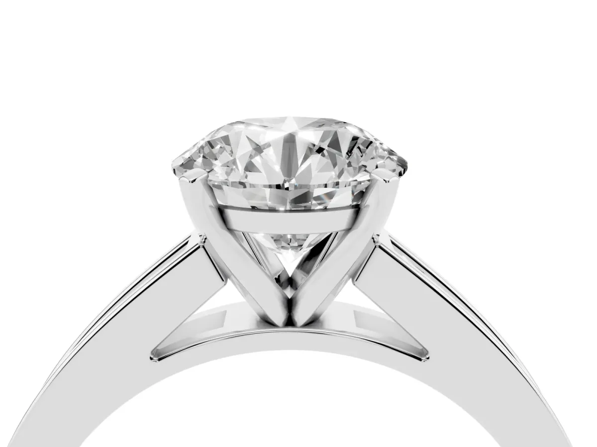 Round Cut Solitaire Diamond Ring with Channel-Set Band and Four-Prong Setting Silver
