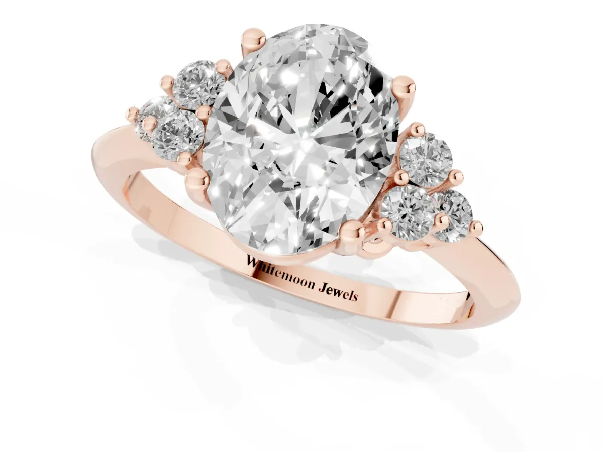 Oval Cut Cut Diamond Cluster Ring with Solitaire Band and Four-Prong Setting Rose gold