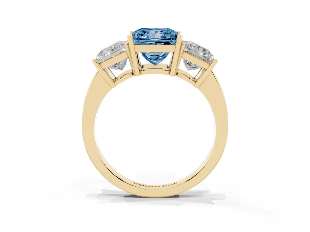Fancy Blue Three-Stone Princess Cut Cut Diamond Engagement Ring with Flat Band and Four-Prong Setting Yellow gold