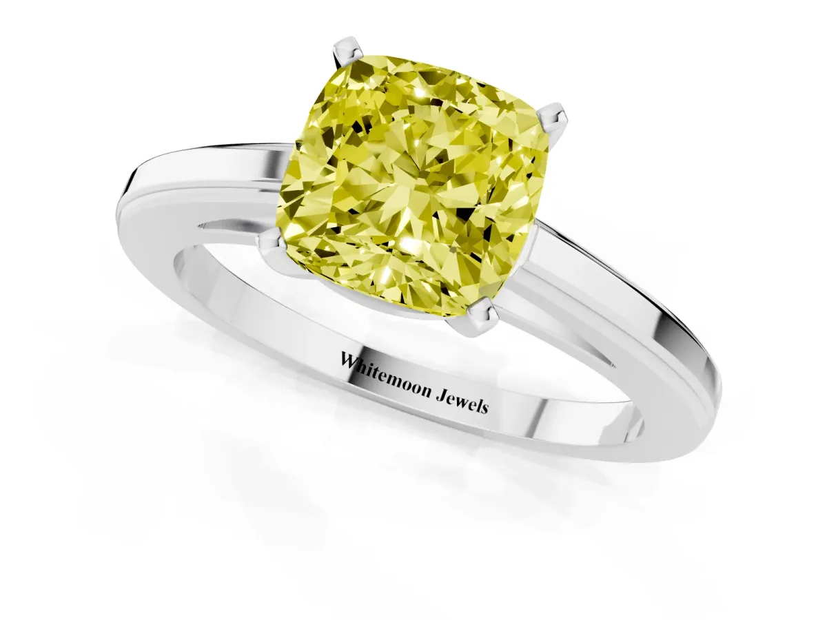 Fancy Yellow Cushion Cut Solitaire Diamond Ring with Four-Prong Setting and Classic Band Silver