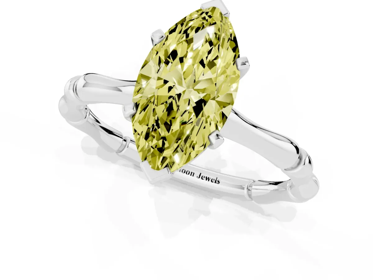 Fancy Yellow Marquise Cut Solitaire Diamond Ring with Bamboo Band and Four-Prong Setting White gold