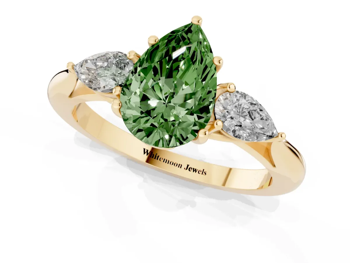 Fancy Green Three-Stone Pear Cut Brilliant Diamond Solitaire Ring with Tapered Band and Four-Prong Setting Yellow gold